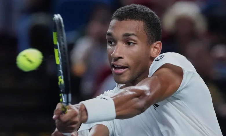 Auger-Aliassime keeps ATP Finals hopes alive with first-round win in Paris