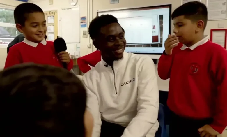 Bukayo Saka shocks kids at old primary school with surprise visit as emotional Arsenal ace calls it 'beautiful feeling'