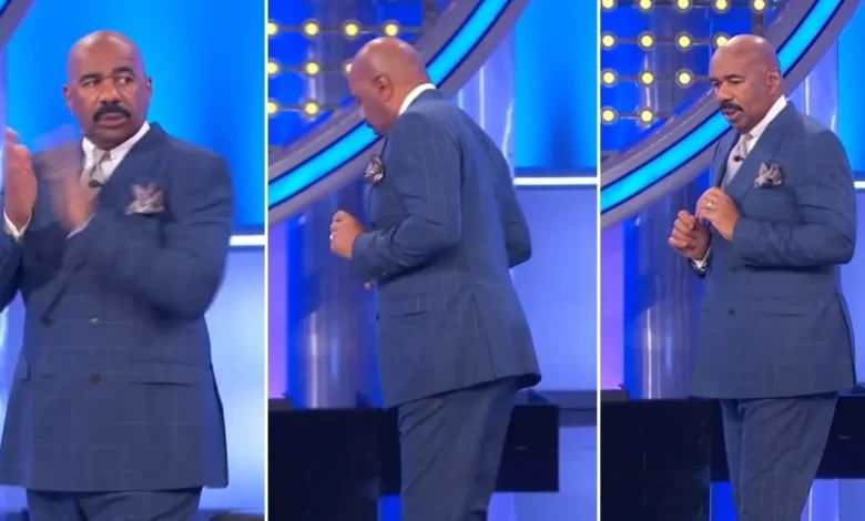 'Family Feud' host Steve Harvey loses his cards on stage while clapping for controversial answer