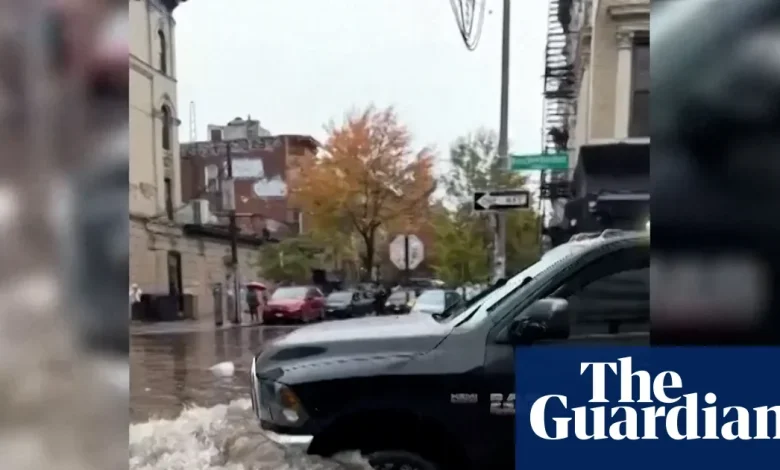 Heavy rain floods streets in New York City – video