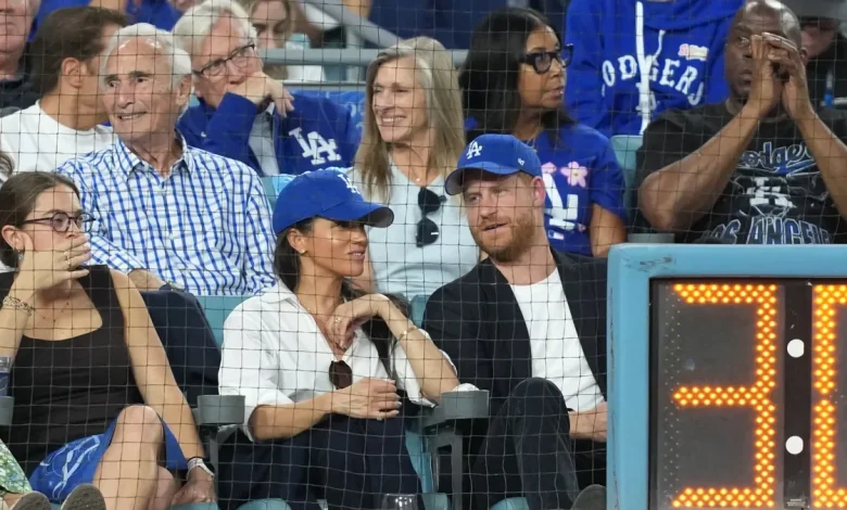 Is that Prince Harry and Meghan Markle at the World Series?