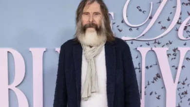 TV legend, 72, looks unrecognisable with long grey beard as he hits the red carpet - can you guess who?