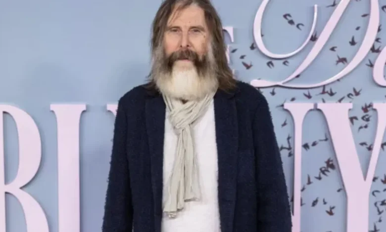 TV legend, 72, looks unrecognisable with long grey beard as he hits the red carpet - can you guess who?