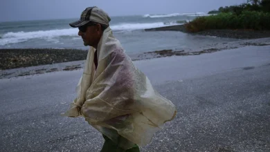 The Latest: Hundreds of thousands evacuate as Hurricane Melissa hits eastern Cuba