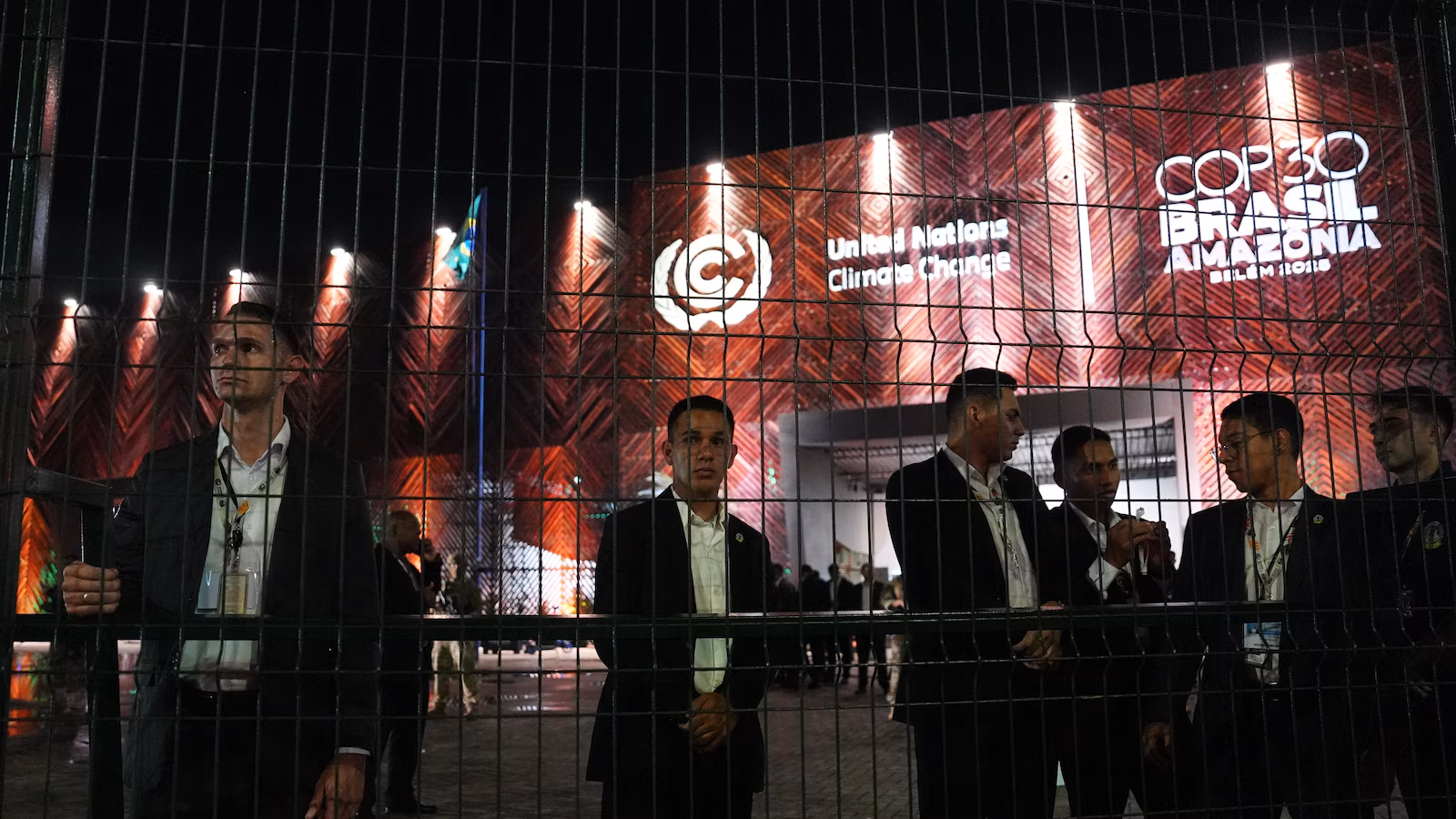 Protesters confront security at main venue of UN climate talks