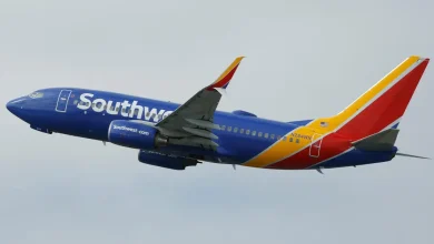 A Southwest plane had to abort its landing after a near miss with a helicopter crossing its path