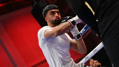 Adam Azim and Kurt Scoby almost come to blows during public workout