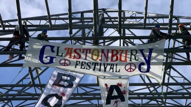 Anti-genocide activists scale Glastonbury Pyramid Stage to demand festival drop Allianz