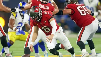 Are the Panthers now in 1st place in the NFC South after the Buccaneers' Week 12 loss?