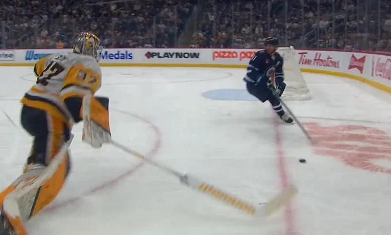 Arturs Silovs throws his stick at Kyle Connor and forces a penalty shot!