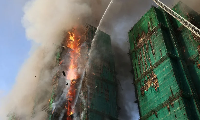 At least 36 killed after fire engulfs Hong Kong high-rise buildings - with 279 reported missing