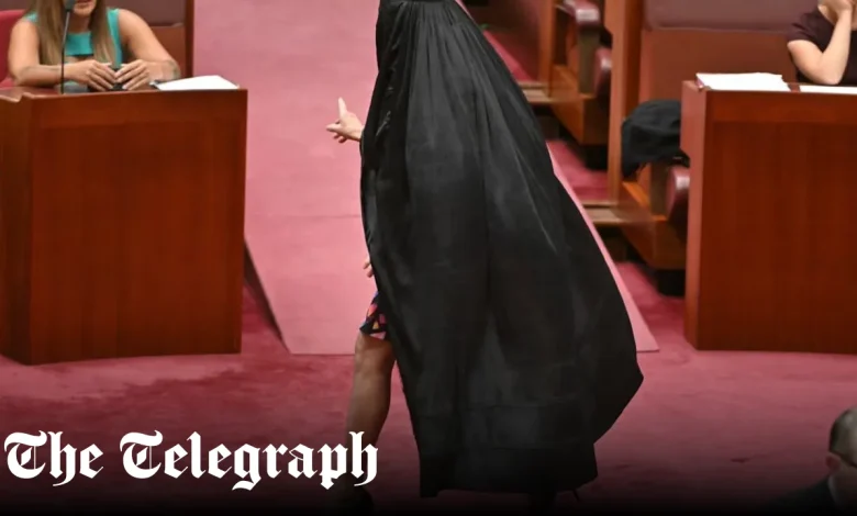 Australian senator accused of ‘blatant racism’ over burka protest