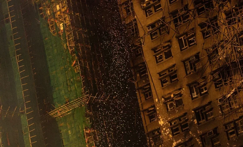 Bamboo scaffolding helped build Hong Kong’s skyline, but a deadly fire may hasten its end