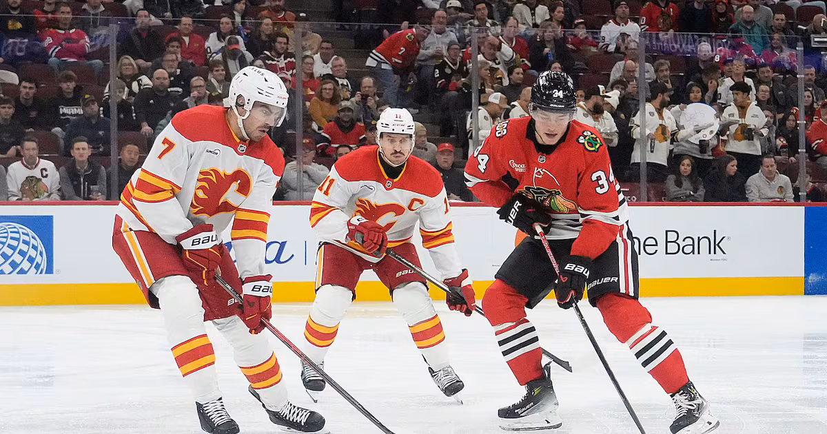 Bedard nets hat trick as Blackhawks beat Flames