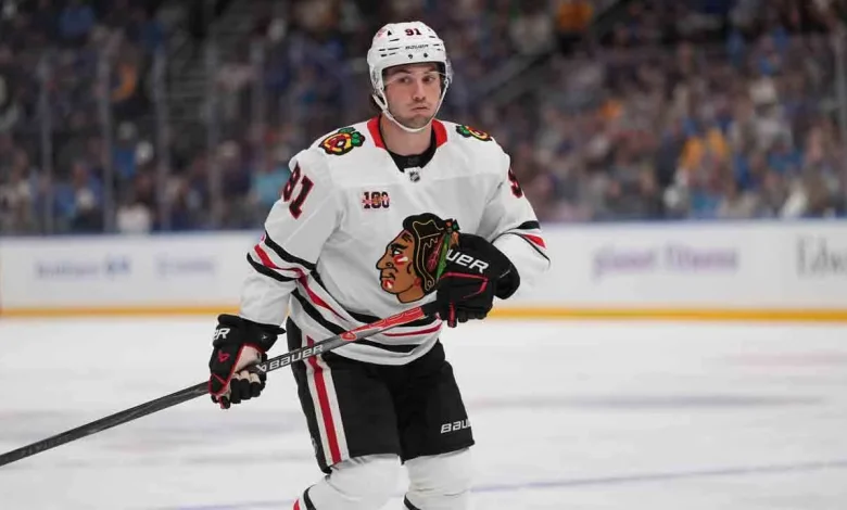 Blackhawks' Frank Nazar exits vs. Flames with apparent injury