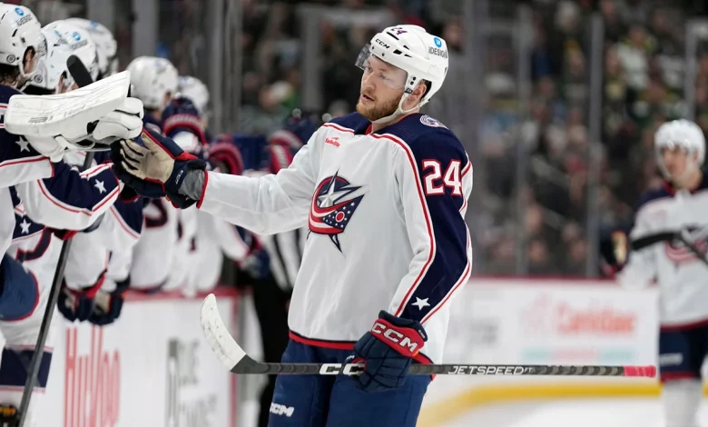 Blue Jackets' Mathieu Olivier ejected for boarding Canucks D Elias Pettersson