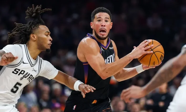 Booker scores 28 and Wembanyama has off night as Suns hand Spurs their first loss, 130-118