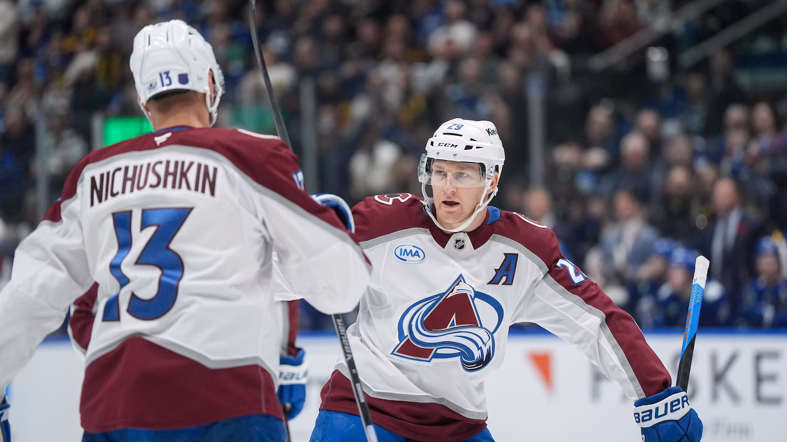 Brindley scores in OT, MacKinnon has 2 goals and 3 assists as Avalanche beat Canucks 5-4