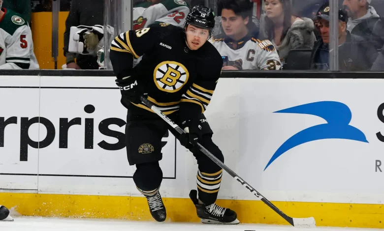 Bruins place Johnny Beecher on waivers