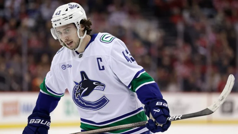 Canucks’ Quinn Hughes misses practice, day-to-day with injury