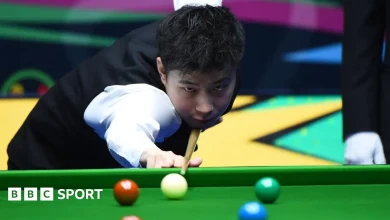 Champion of Champions: Zhao Xintong wins black-ball decider Kyren Wilson to reach semi-finals