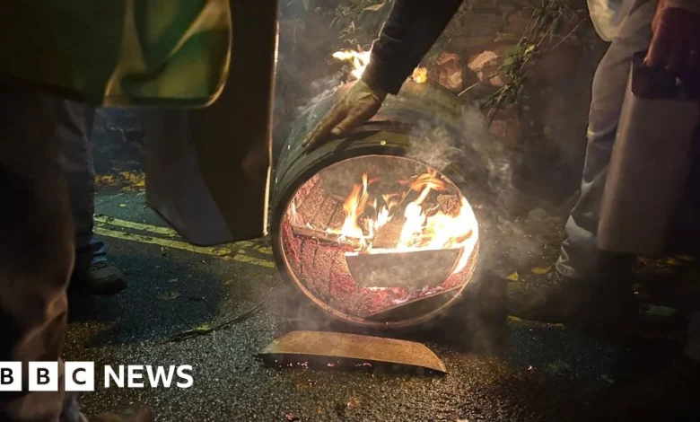 Clean up of flaming Tar Barrels under way in Ottery St Mary