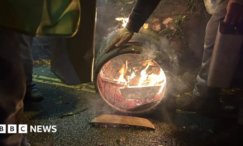 Clean up of flaming Tar Barrels under way in Ottery St Mary