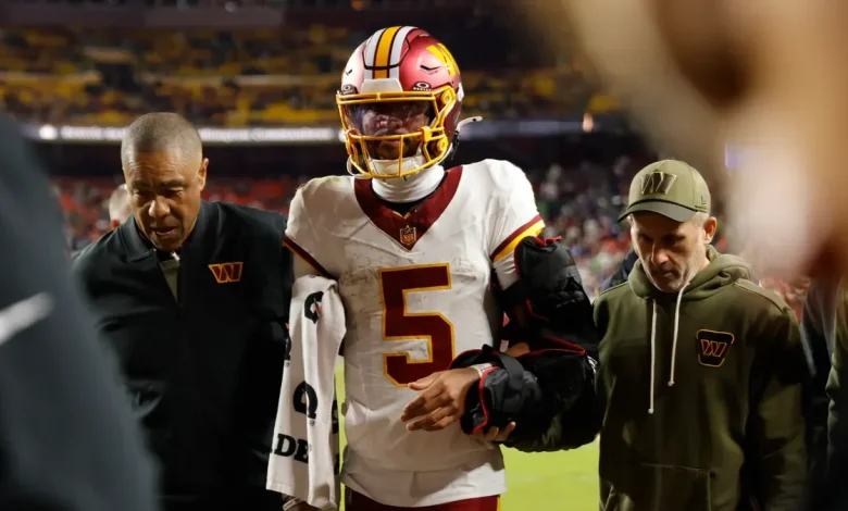 Dan Quinn explains why he kept Commanders QB Jayden Daniels in game before elbow injury