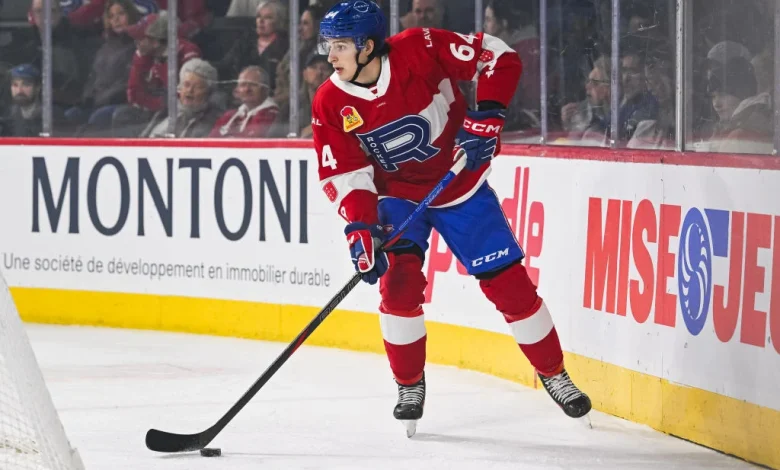 David Reinbacher scores in front of several NHL scouts