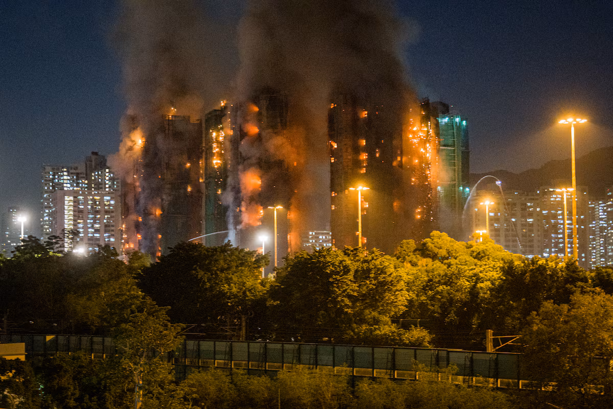 Deadly fire engulfs multiple apartment blocks in Hong Kong