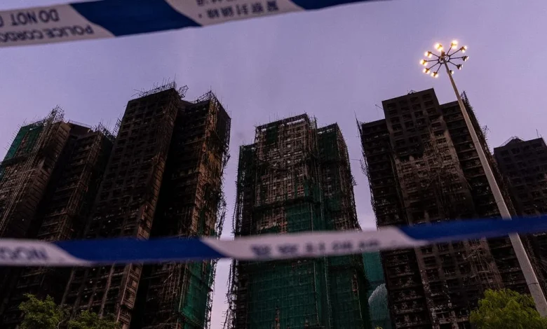Death toll keeps rising, eight more arrested after Hong Kong tower fire