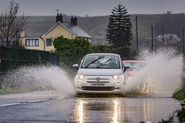 Deluge of rain leads to flooding across NI amid Met Office warning