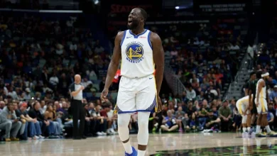 Draymond confronts fan over 'Angel Reese' chant