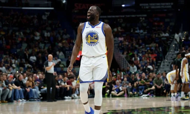 Draymond confronts fan over 'Angel Reese' chant