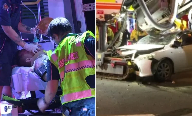 Driver trapped under roadworks machine; man fights for life