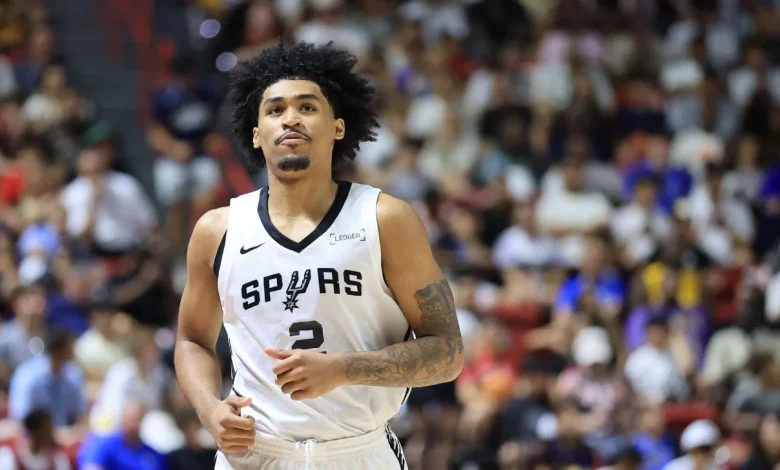 Dylan Harper (calf) exits Spurs' first loss in walking boot