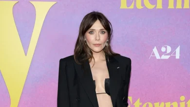 Elizabeth Olsen Elevates Office Wear with Unique Twist at Eternity Screening