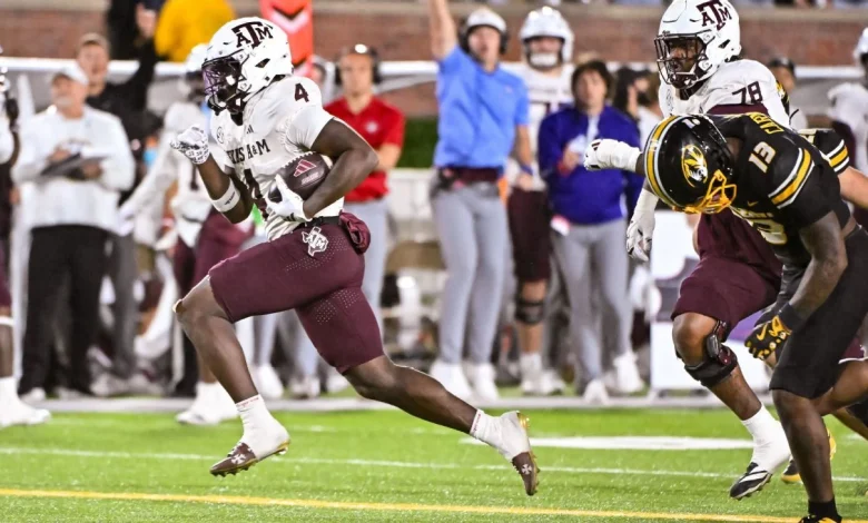 Elko bristles at past, urges 9-0 Aggies to 'finish'