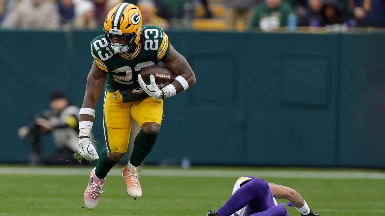 Emanuel Wilson runs for 107 yards and 2 TDs as Packers pound Vikings 23-6