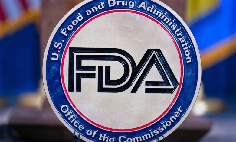 FDA says drugmakers have recalled a blood pressure medicine tainted with a cancer-causing chemical