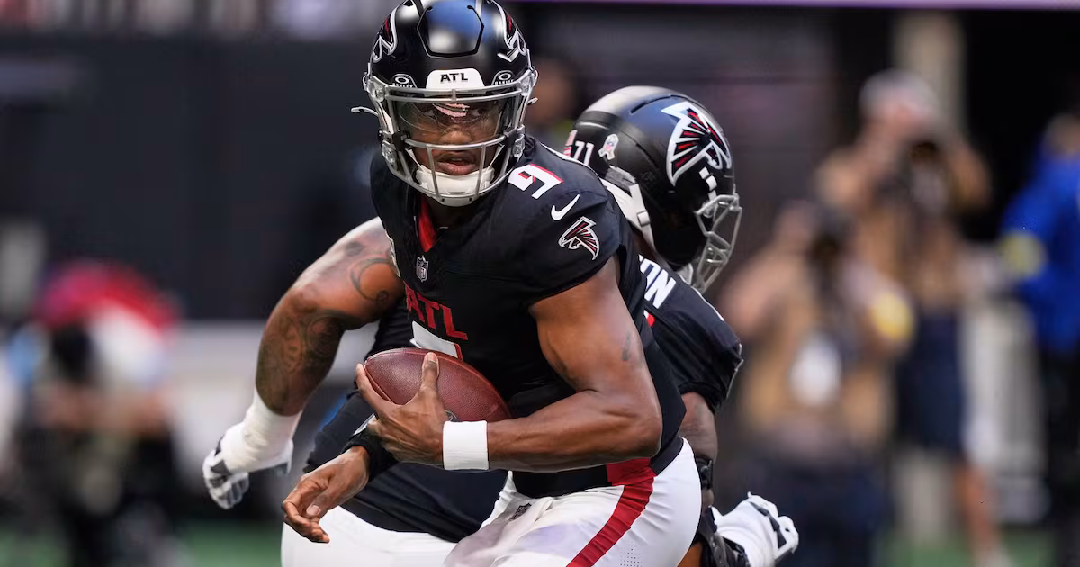 Falcons QB Penix injures knee, replaced by Cousins
