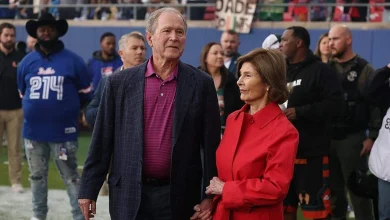 Former U.S. president does coin toss at Dallas Cowboys-Arizona Cardinals game