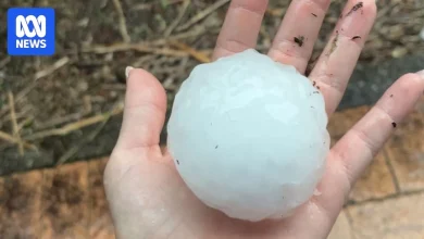 Giant hail hits parts of Qld with severe weather warnings in place