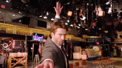 Glen Powell Channels Christopher Walken Getting Into The Groove For ‘SNL’ Hosting Duty, With One Small Accident