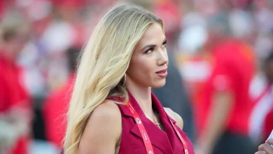 Gracie Hunt rocks full-length custom Chiefs red coat at Broncos game