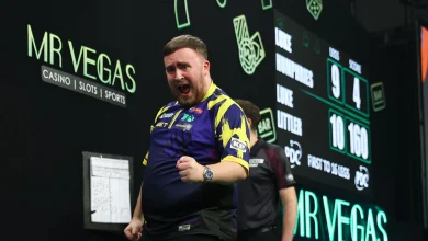 Grand Slam of Darts: Luke Littler defends his crown with 16-11 victory over Luke Humphries
