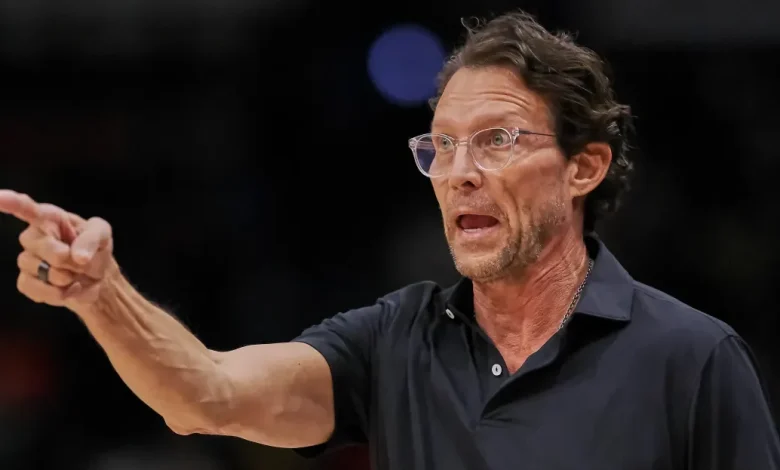 Hawks trip into several rakes, giving Wiz their second win, 132-113