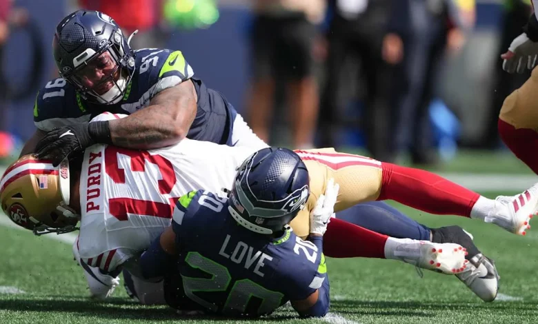 How Mike Macdonald is authoring a new chapter of Seahawks defensive dominance ahead of matchup with 'Legion of Boom' cornerstone Dan Quinn