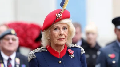 Incredible pictures show Queen Camilla overcome with emotion as she honours war dead