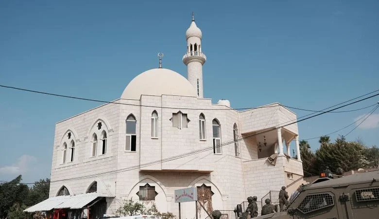 Israeli settlers torch mosque and spray graffiti in latest West Bank attack